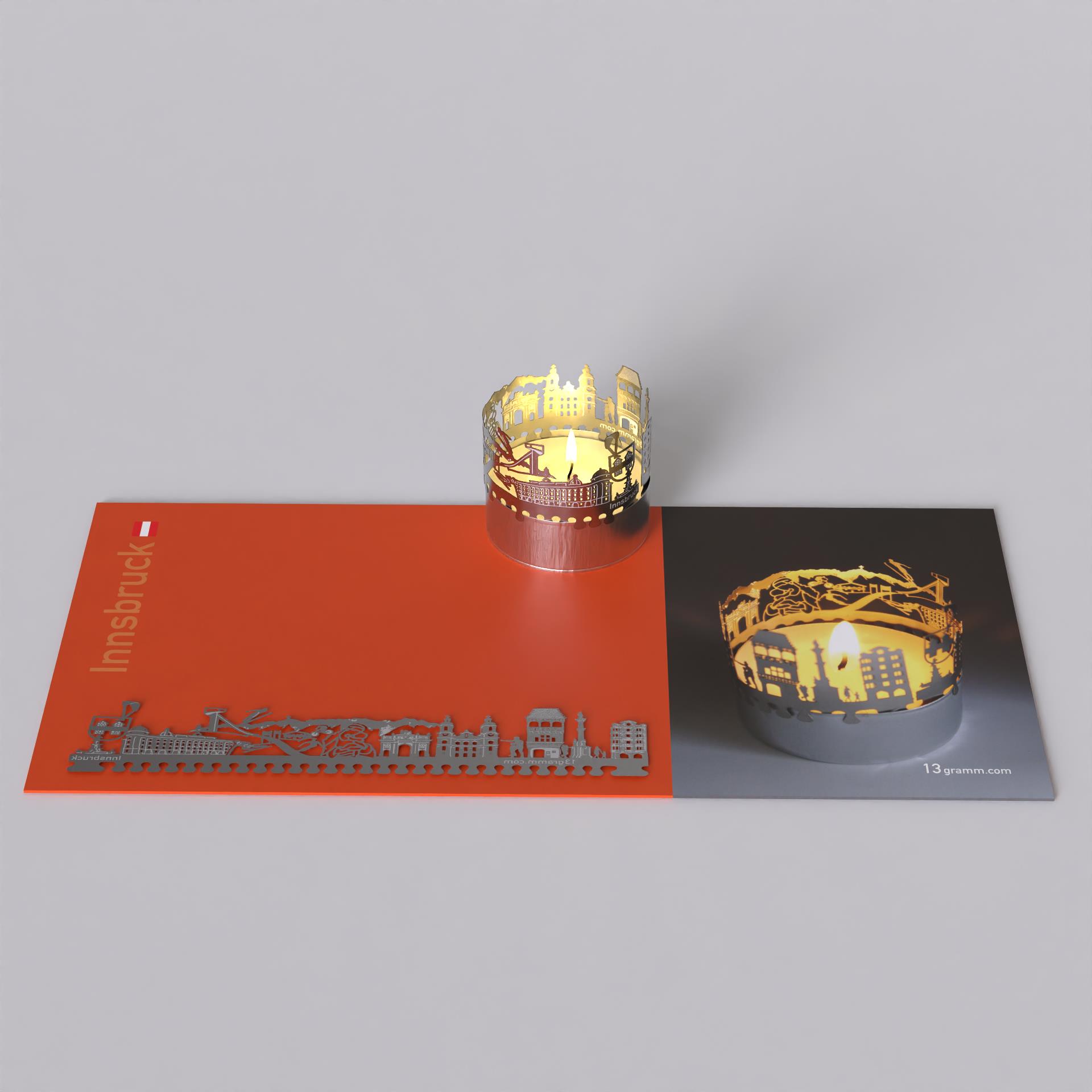 153_Mitbringsel_Innsbruck_Souvenir_Motivkerze_Teelicht_Beleuchtung_Schattenspiel_Dom-St_Jaco_Triumpfpforte_Bergisl-Schanze_Annasaeule_Wintersport_Kulturerbe
